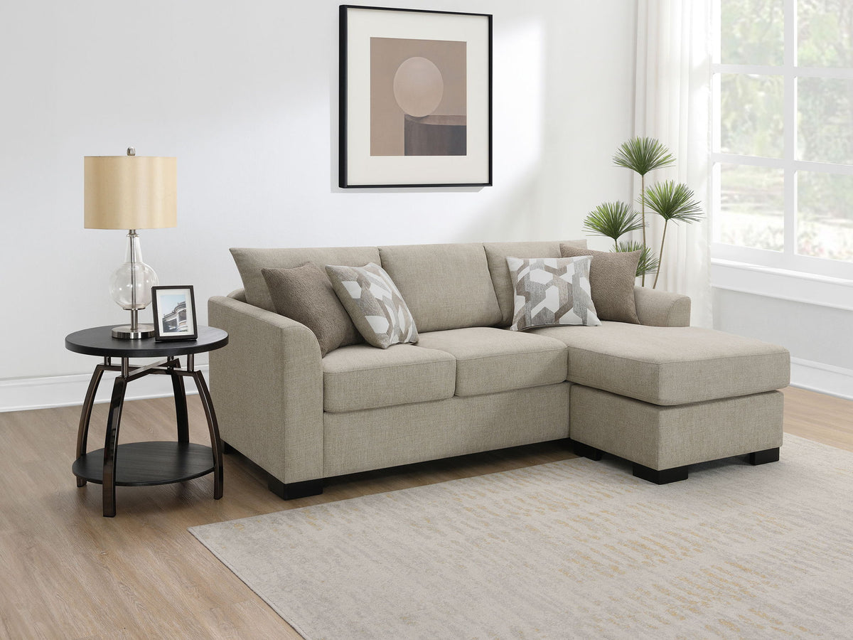 Camel upholstered sleeper sectional chaise sofa with square arms, three seat cushions, dark legs.