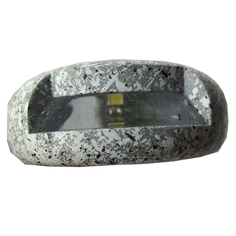 Grey speckled oval solar garden lamp side view with clear cover window