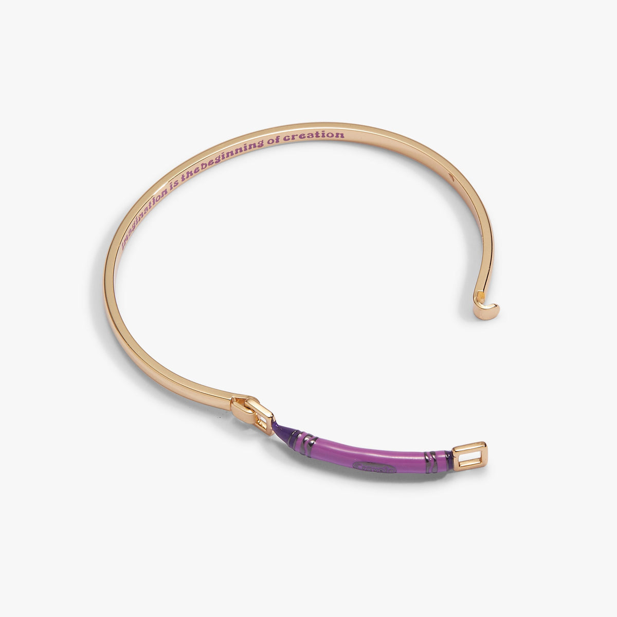 Gold-tone crayon-style tension bangle with purple center stripe and open gap
