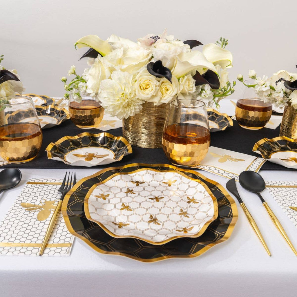 Wavy paper salad plate centerpiece, white honeycomb grid with gold bees and dark rim