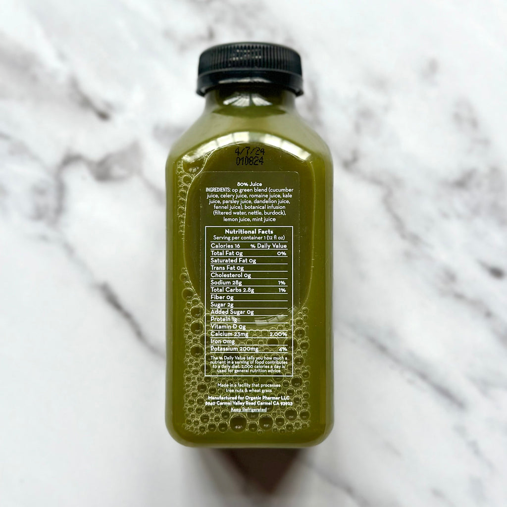 Organic green juice bottle with black cap, back nutrition facts panel