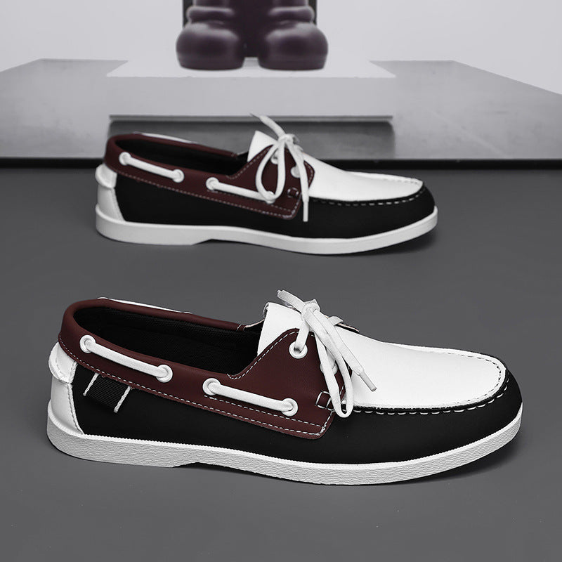 Men's dual-color loafers: white soles, black uppers with brown-trim accents