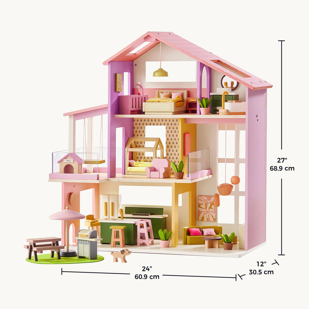 Pink and green multi-level dollhouse with furnished rooms and roof overhang
