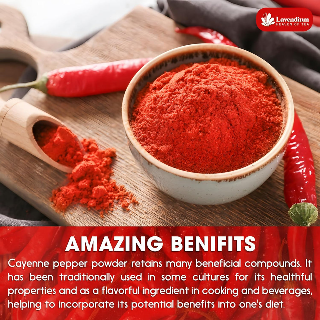 Ceramic bowl of fine red cayenne pepper powder with whole red chili peppers