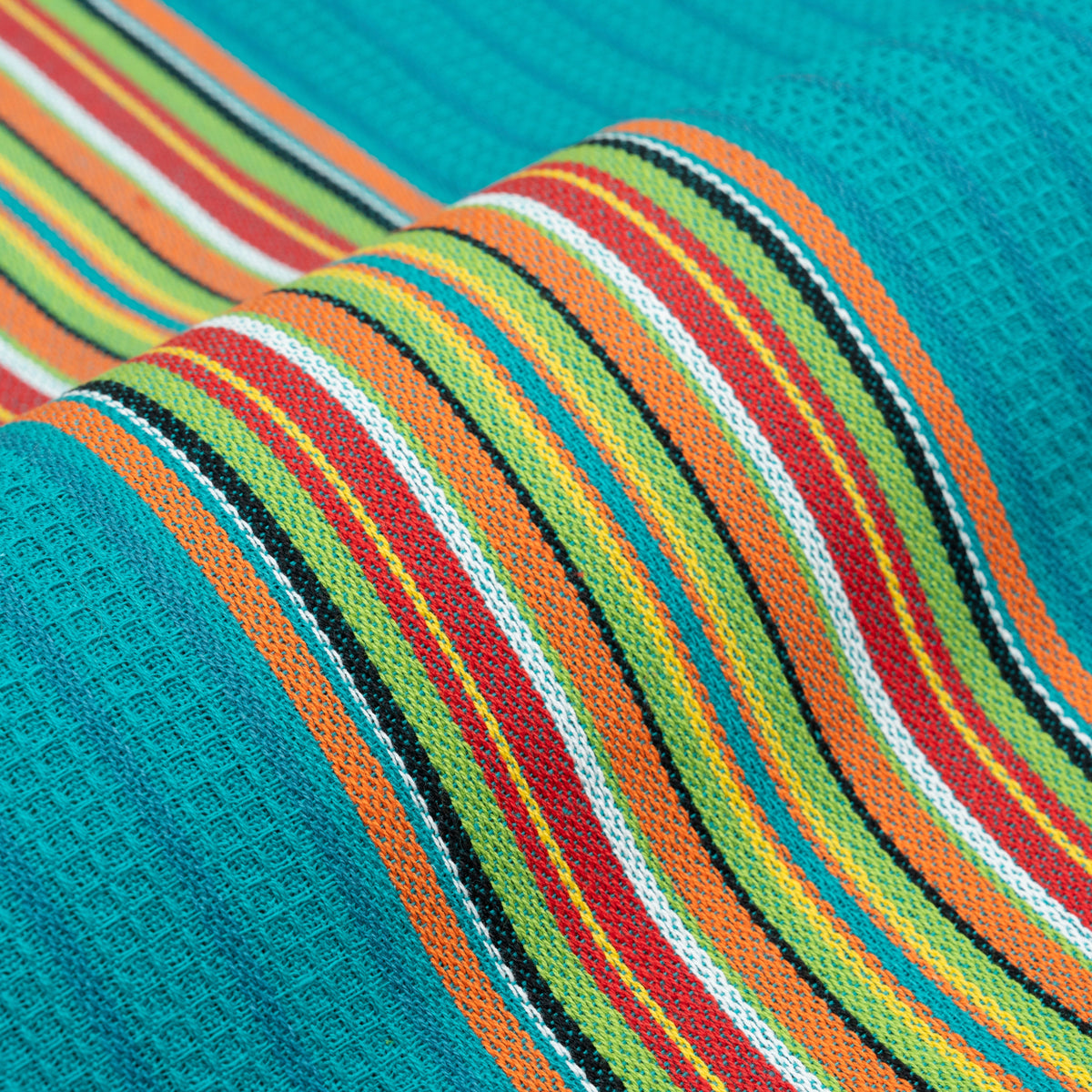 Close-up of teal kitchen towel with multicolor striped weave