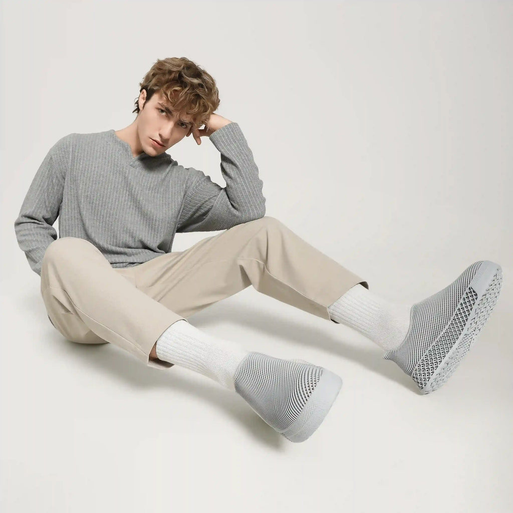 Gray 3D-printed sneakers with textured knit upper and molded sole