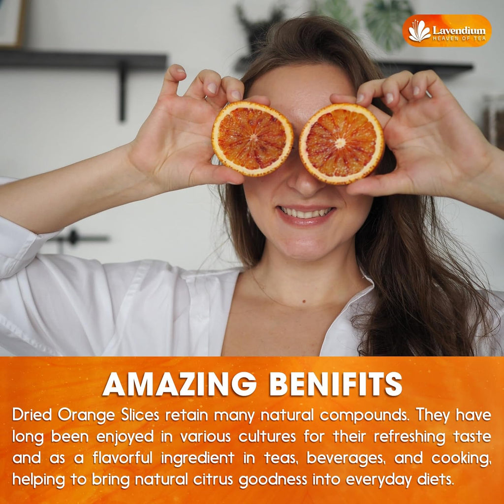 Dried orange slice halves held up to the eyes for a fresh citrus look