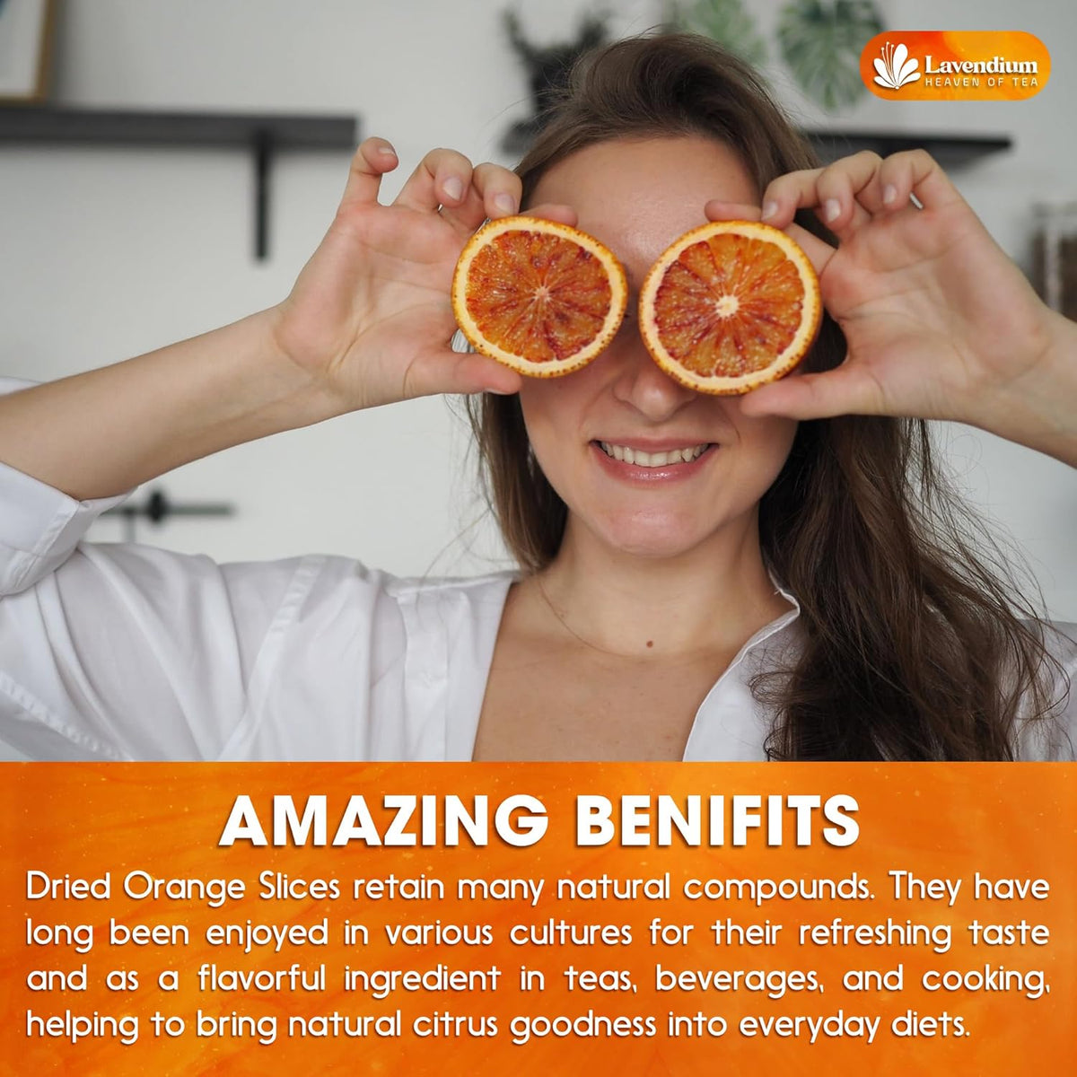 Dried orange slice halves held up to the eyes for a fresh citrus look