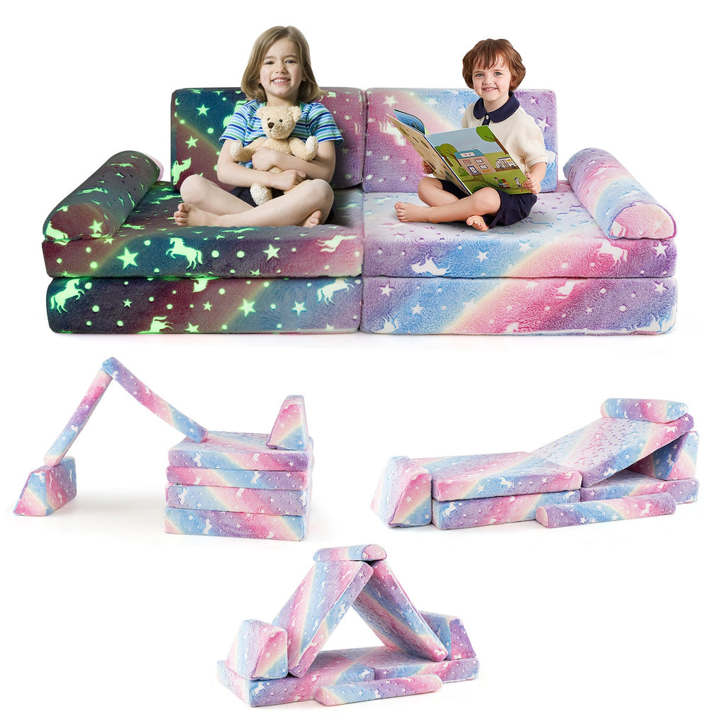 Kids modular play couch set, star-pattern cushions in pink and blue, two children seated