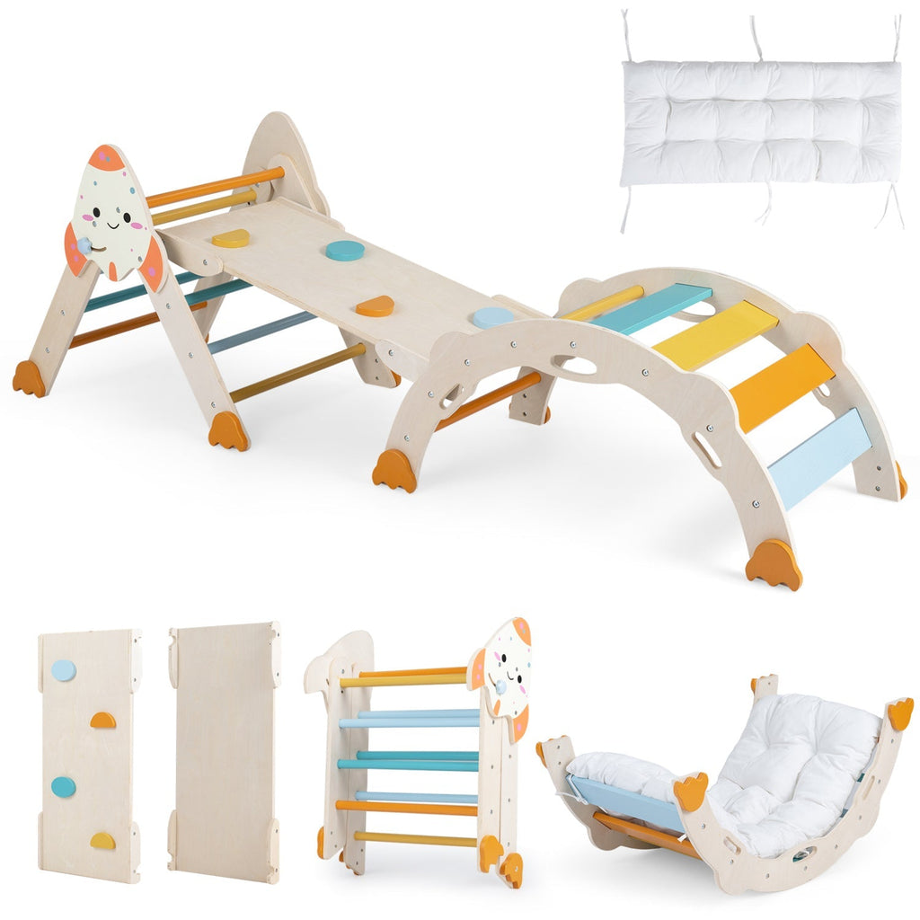 Wooden toddler climbing set with rocket theme, blue steps, orange feet, and white seat cushion.