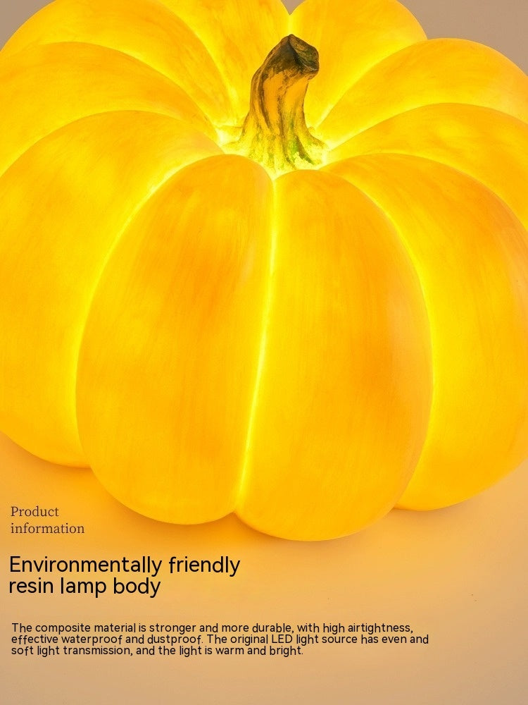 Yellow pumpkin-shaped resin lamp light, ridged surface close-up