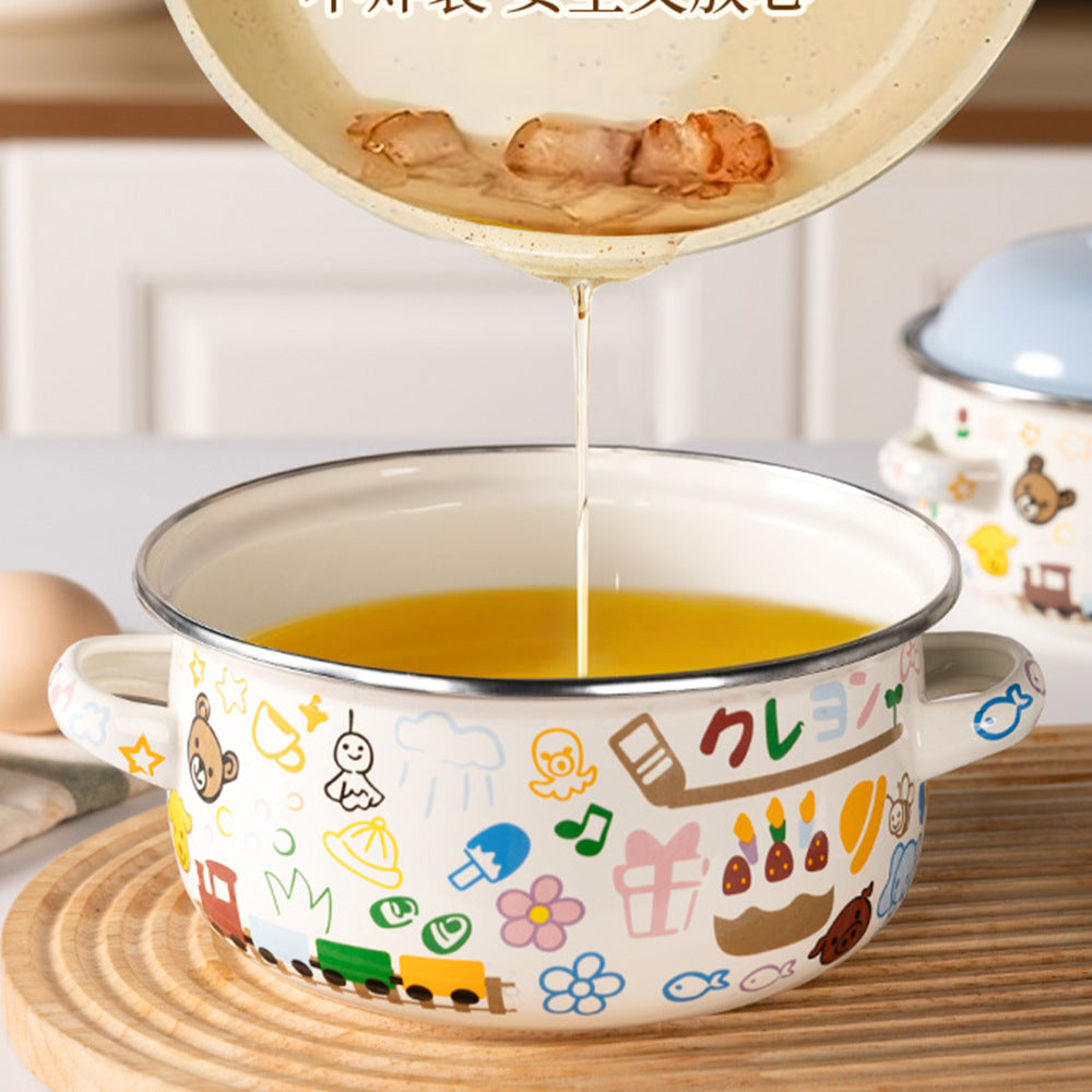 Enameled noodle bowl with cartoon print and handles, broth pouring inside.
