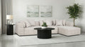Light beige 3-piece sectional sofa with square arms and tufted seat cushions