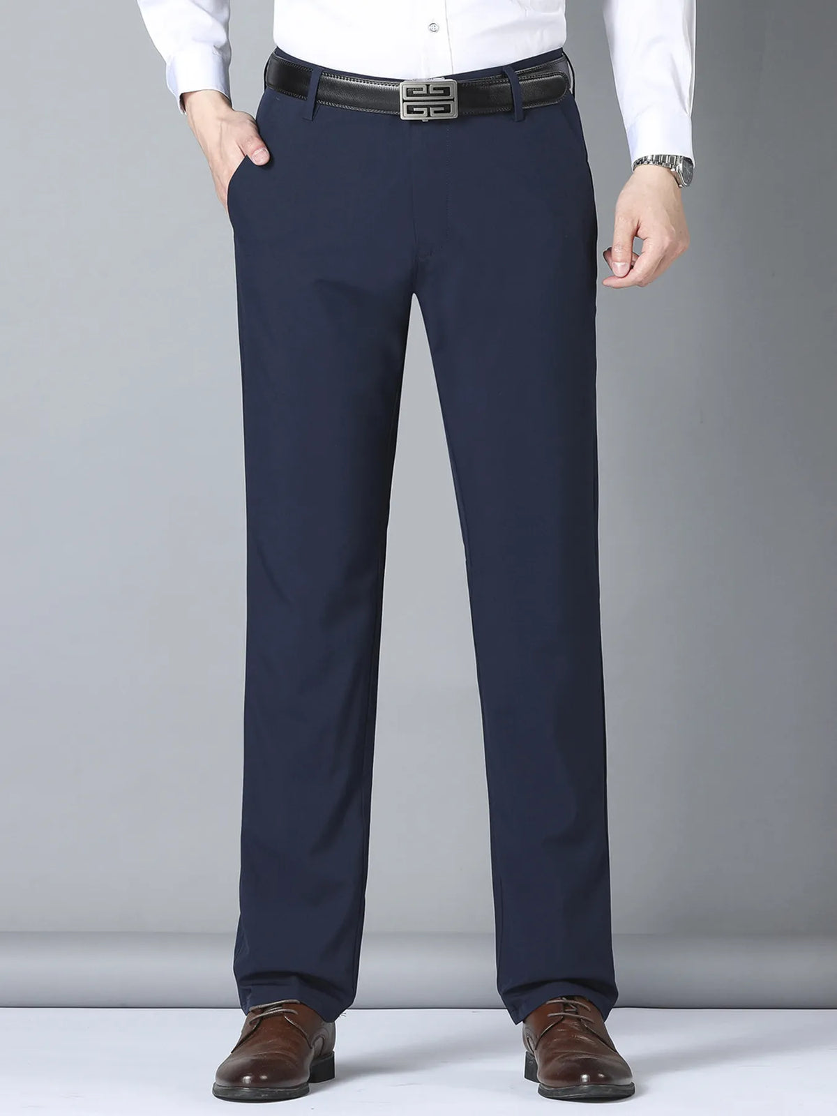 Men's slim fit casual pants, navy blue front view with belt loops