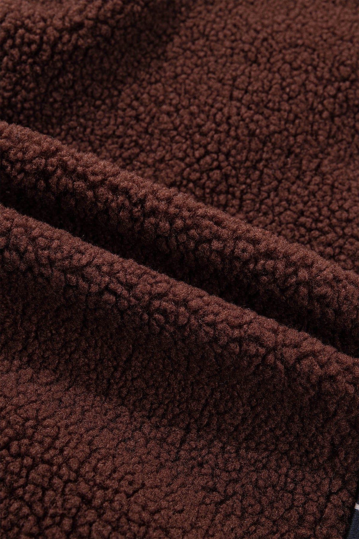 Brown sherpa fleece texture detail