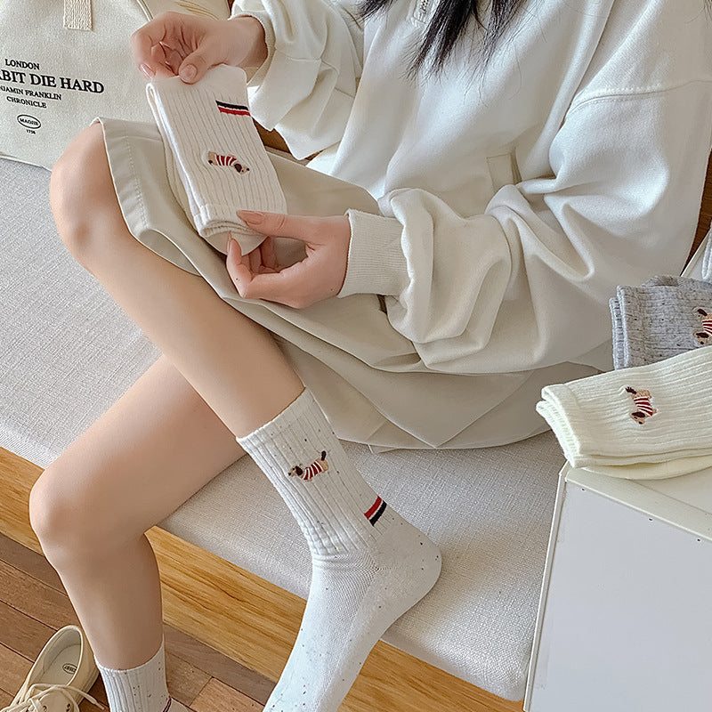 Children's white ribbed socks with dog embroidery and red/blue stripe on cuff
