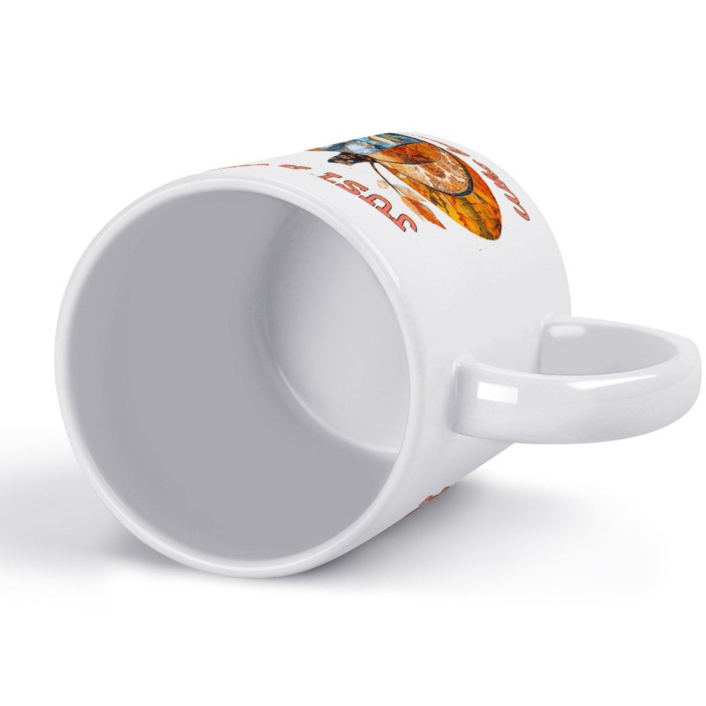 White ceramic mug with handle, angled view showing the open rim