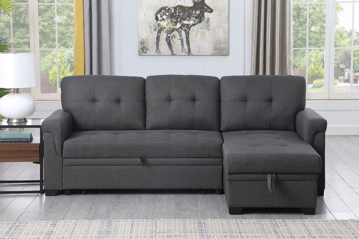 Dark gray sectional sofa with storage chaise, tufted back and chaise with storage compartment.
