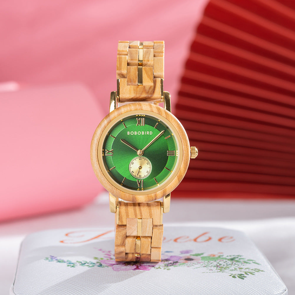Light wood wooden quartz watch with green dial, Roman numerals, and link bracelet