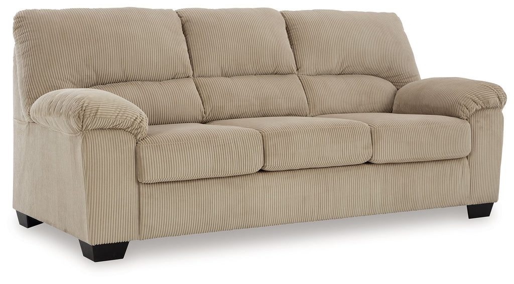 Upholstered sofa in beige fabric with rolled arms and tufted seat cushion panels