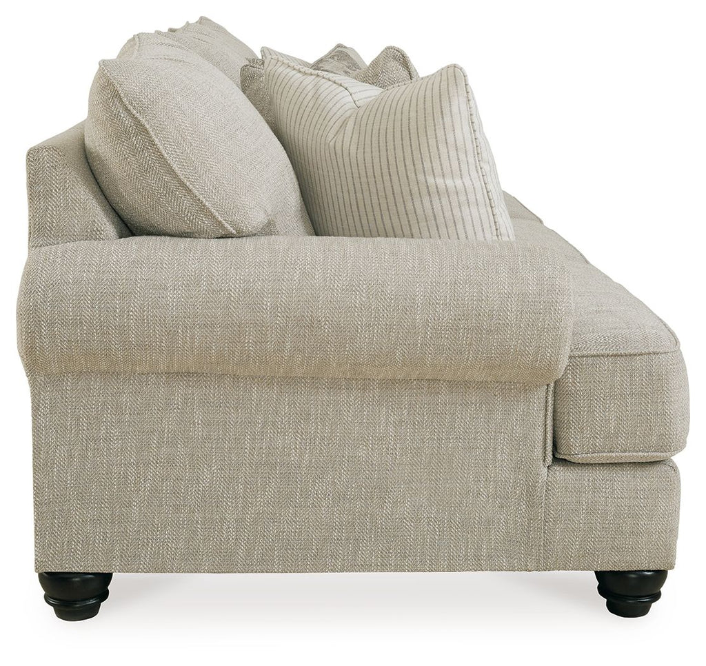 Fog sofa arm and seat in light beige fabric with matching accent pillows