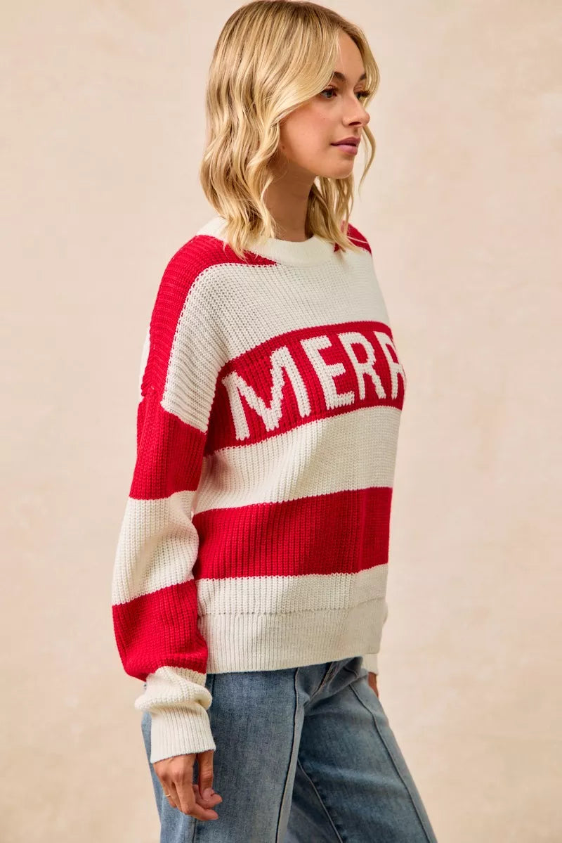 Ivory and red striped knit sweater with “MERR” lettering visible on sleeve/side