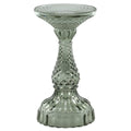 Green glass pillar candle holder with flared top and textured base