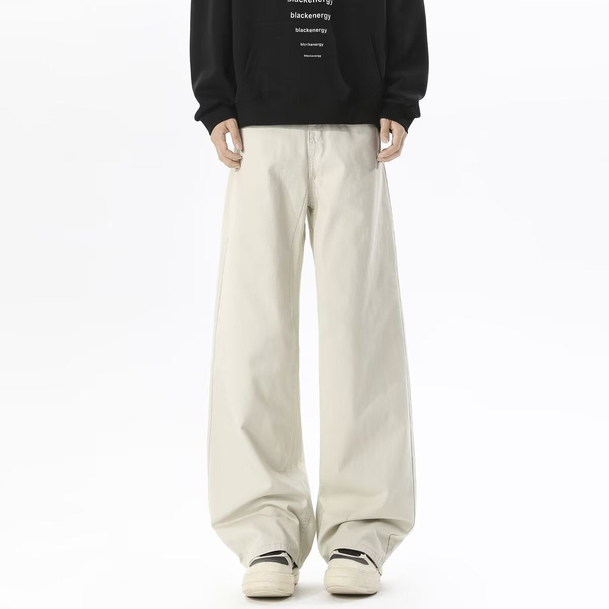 Beige cargo pants with straight wide legs and front pocket styling, long trousers
