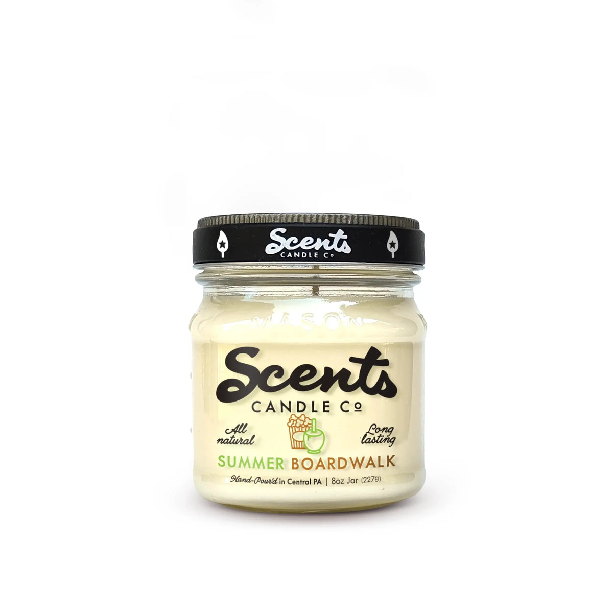 Soy wax candle jar with black screw-top lid, pale cream wax, Summer Boardwalk label.
