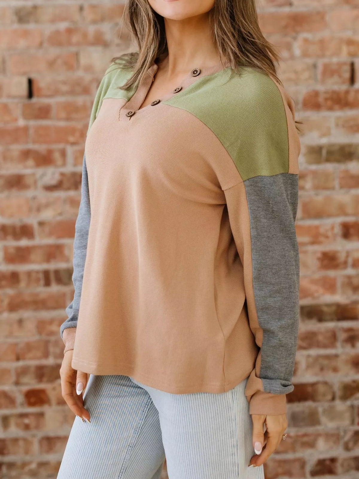 Color block thermal henley top in camel with green yoke and gray long sleeves