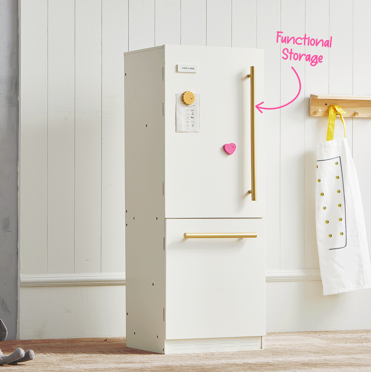 White play kitchen refrigerator cabinet with golden handle and door storage compartments