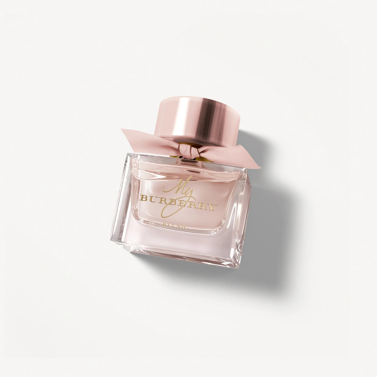My Burberry Blush eau de parfum bottle, angled view, pink glass with metallic cap