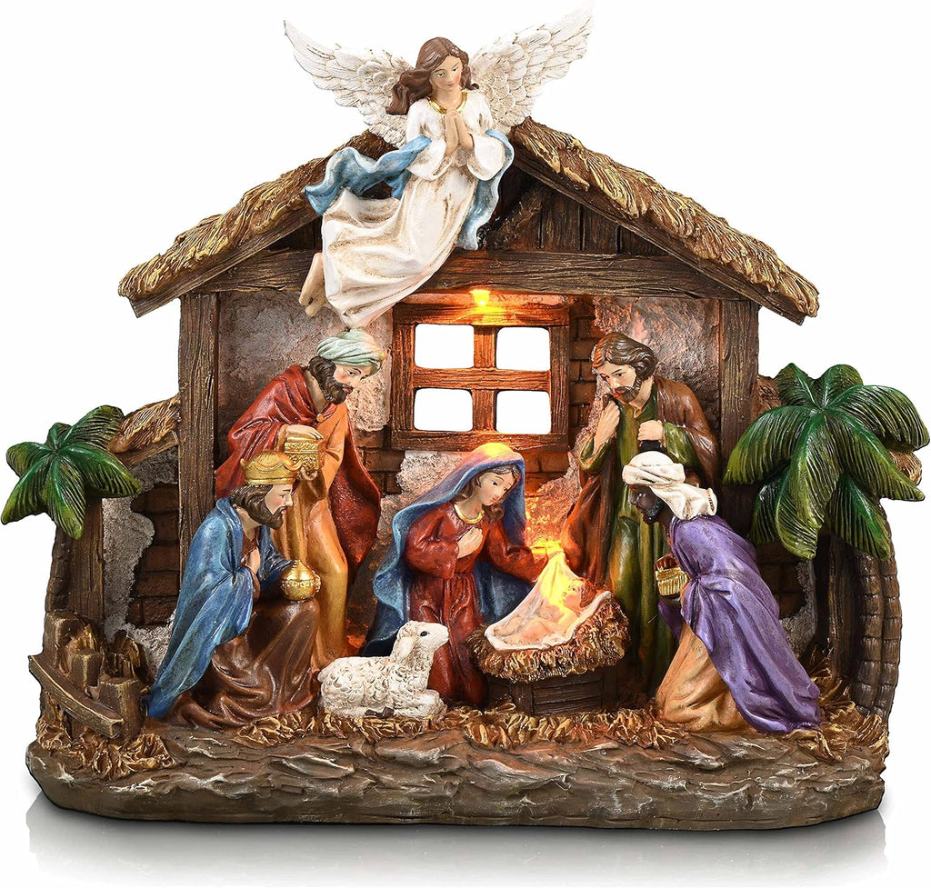 LED-lit resin nativity scene figurines in wooden stable with angel, Mary, Joseph, and baby