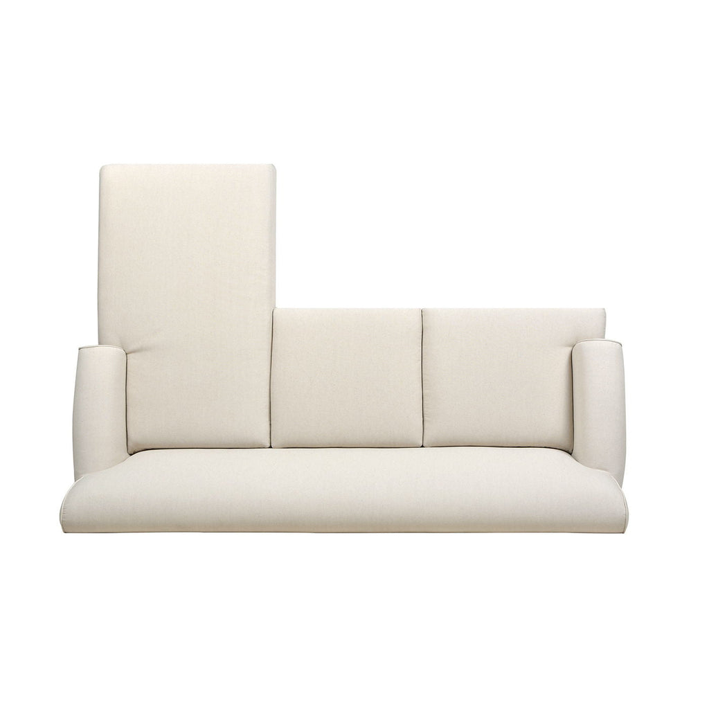 Light beige sofa with tall backrest and vertical seam detailing