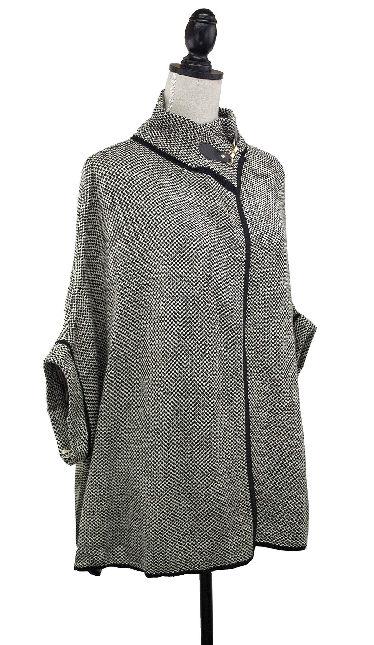 Grey textured knit poncho cardigan with black zipper-front and neck buckle