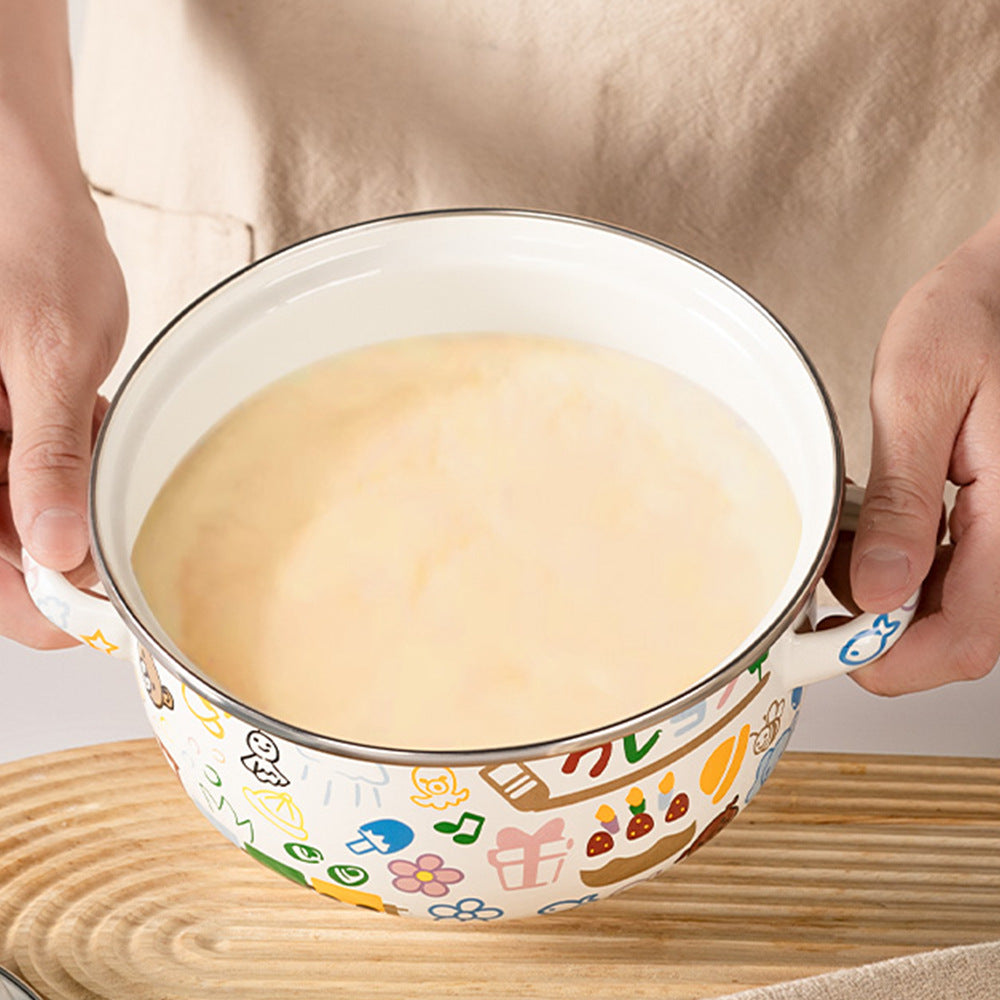 Enameled noodle bowl with colorful cartoon print, held in both hands.