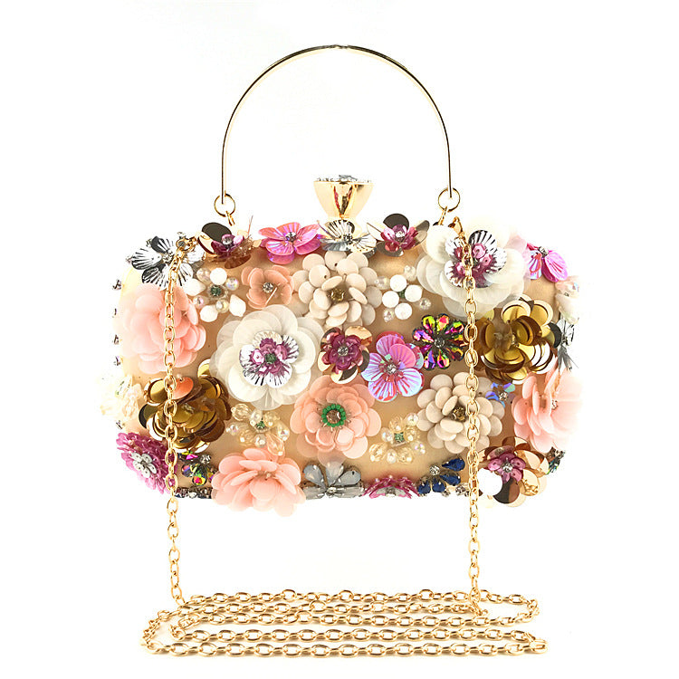 Floral sequin clutch bag with gold chain strap and top handle