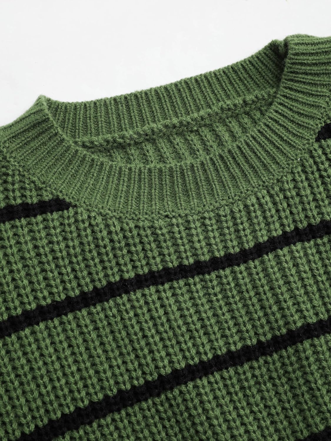 Green ribbed crewneck sweater with black horizontal stripe detail on knit fabric