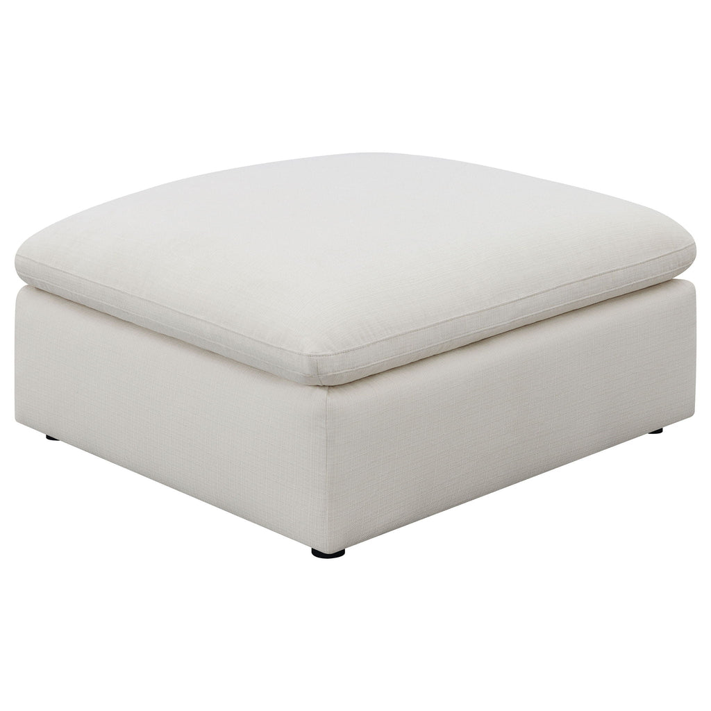 Ivory ottoman module with rounded top and upholstered sides