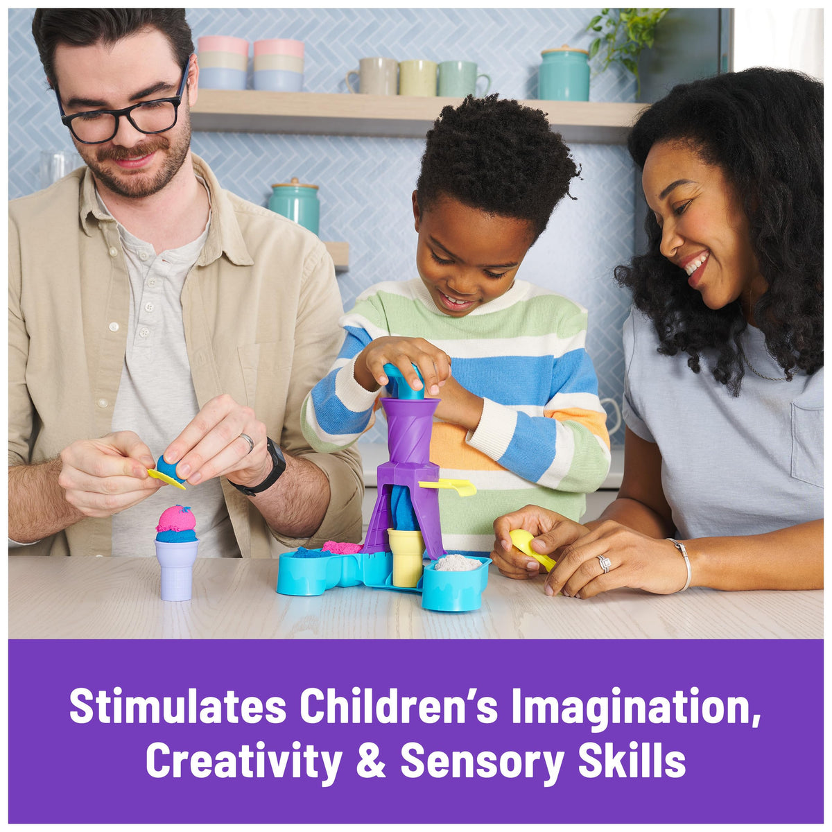 Family using kinetic sand swirl station with purple funnel and ice-cream cups