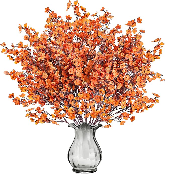 Orange artificial baby's breath bouquet with many tiny blossoms in vase