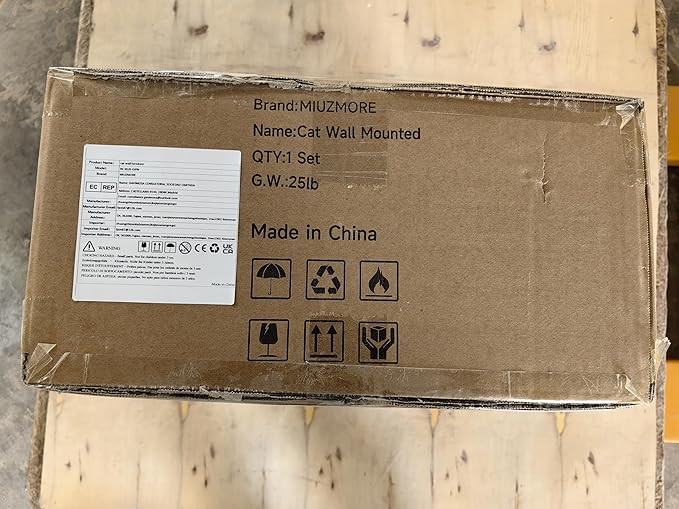 Cardboard box label marked Cat Wall Mounted and Made in China