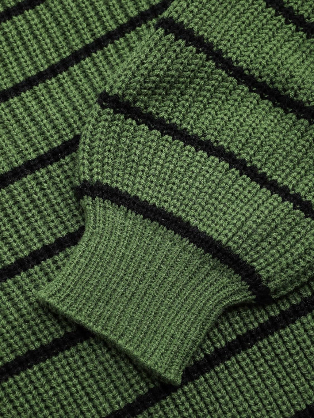 Green striped knit sweater cuff and crewneck edge with black stripe trim