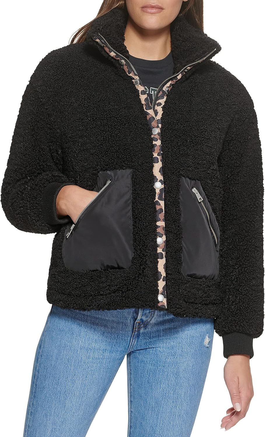 Black sherpa teddy jacket with high collar, leopard trim, and zip front with pockets