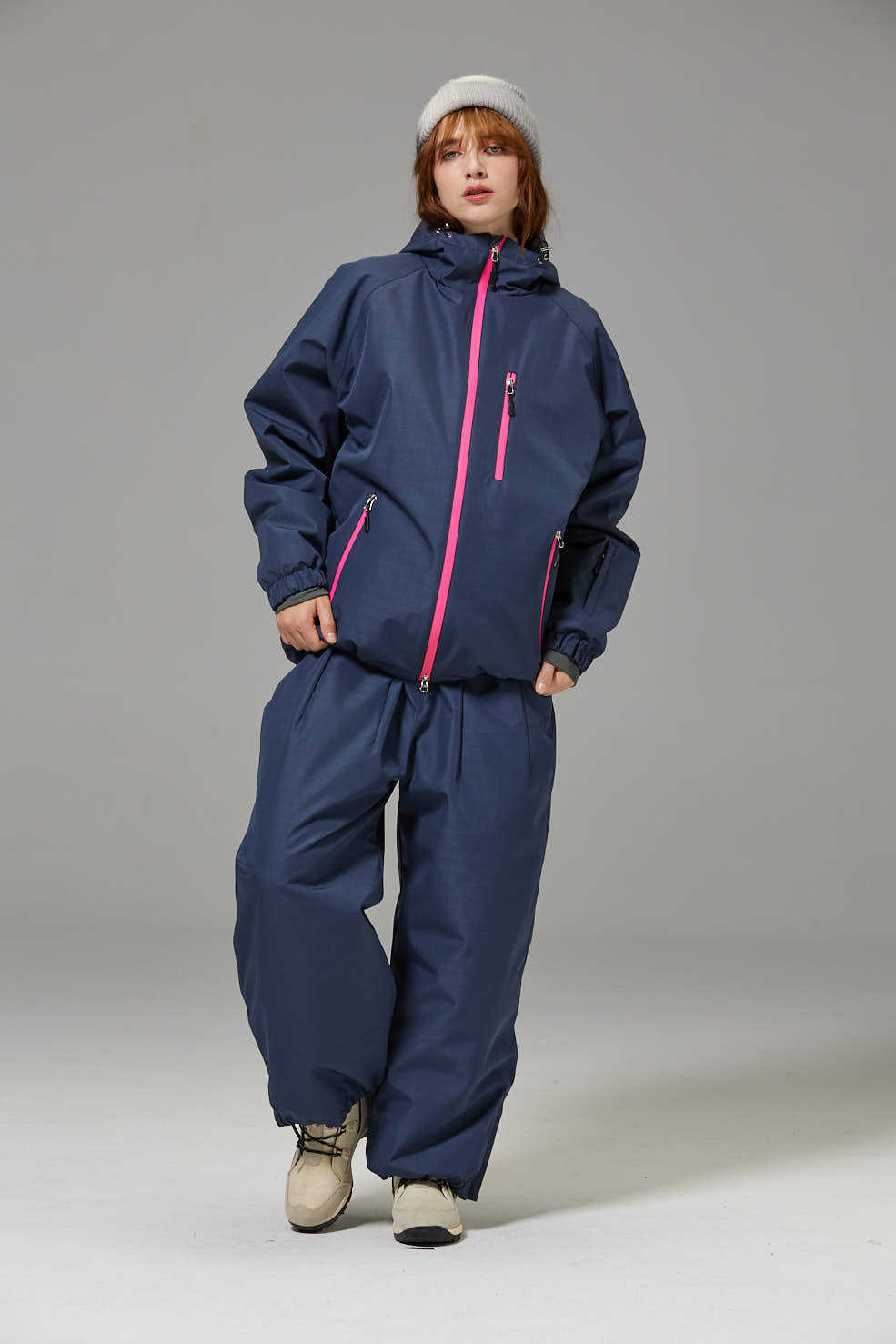 Navy blue unisex ski suit set with pink zipper hooded jacket and matching loose pants