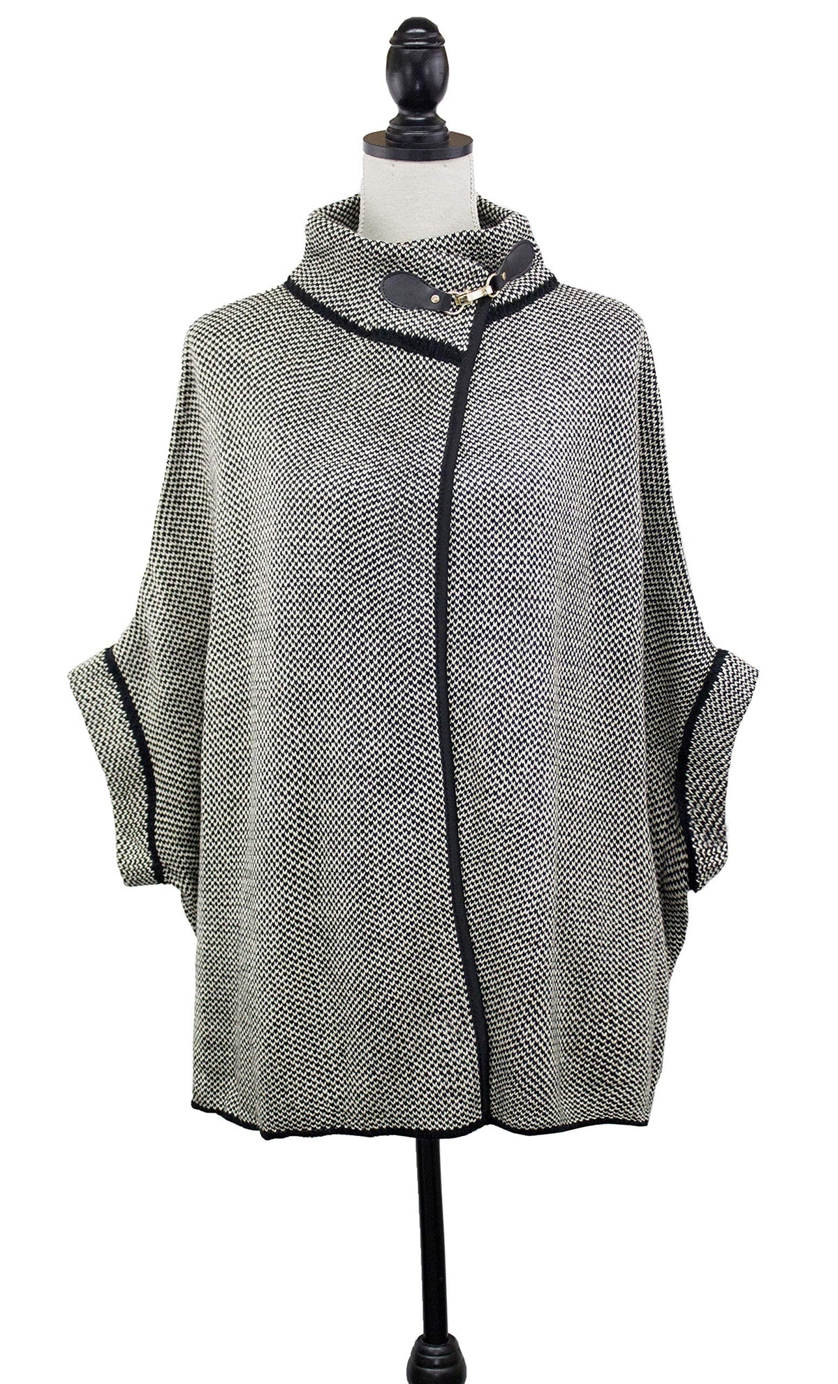 Grey knit shawl cardigan with black trim, buckle at the neck, wide dolman sleeves