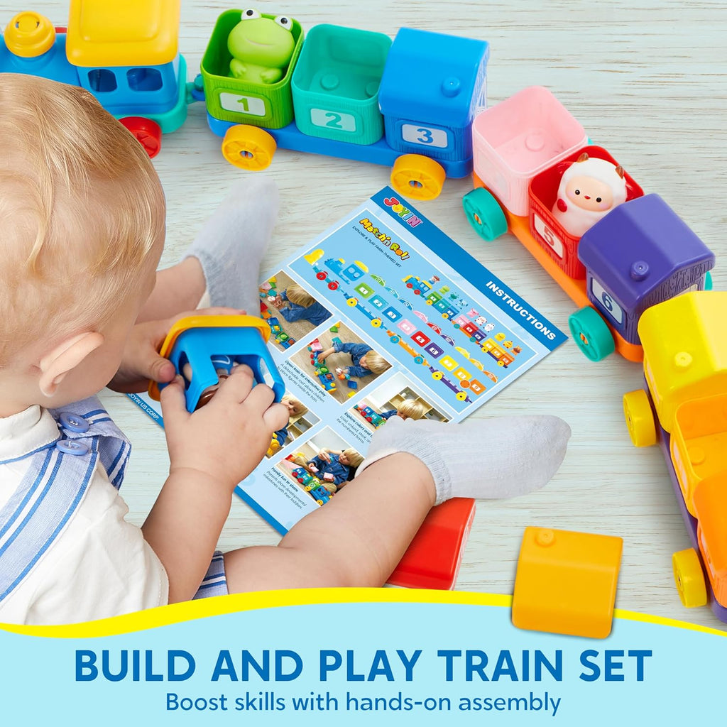 Child assembling a colorful farm train set on a table with numbered blocks and animals