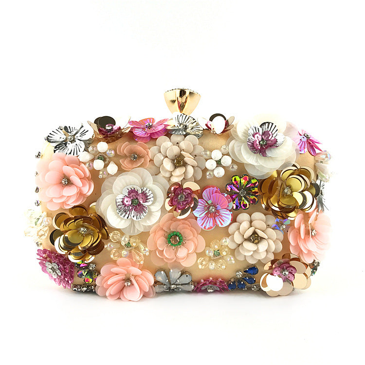 Floral sequin clutch bag with gold-tone clasp and gold chain strap