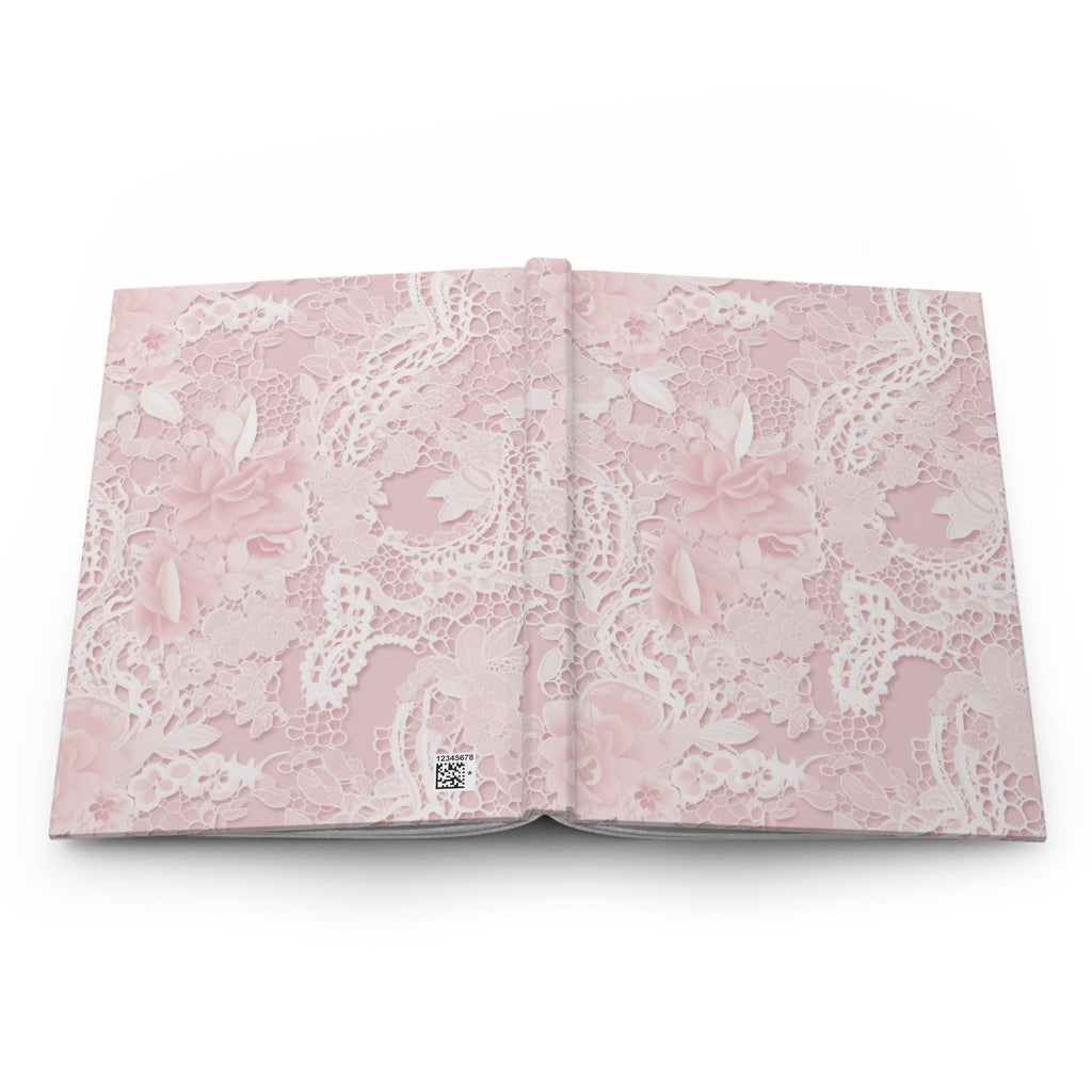 Open pink floral lace hardcover journal with patterned inner covers