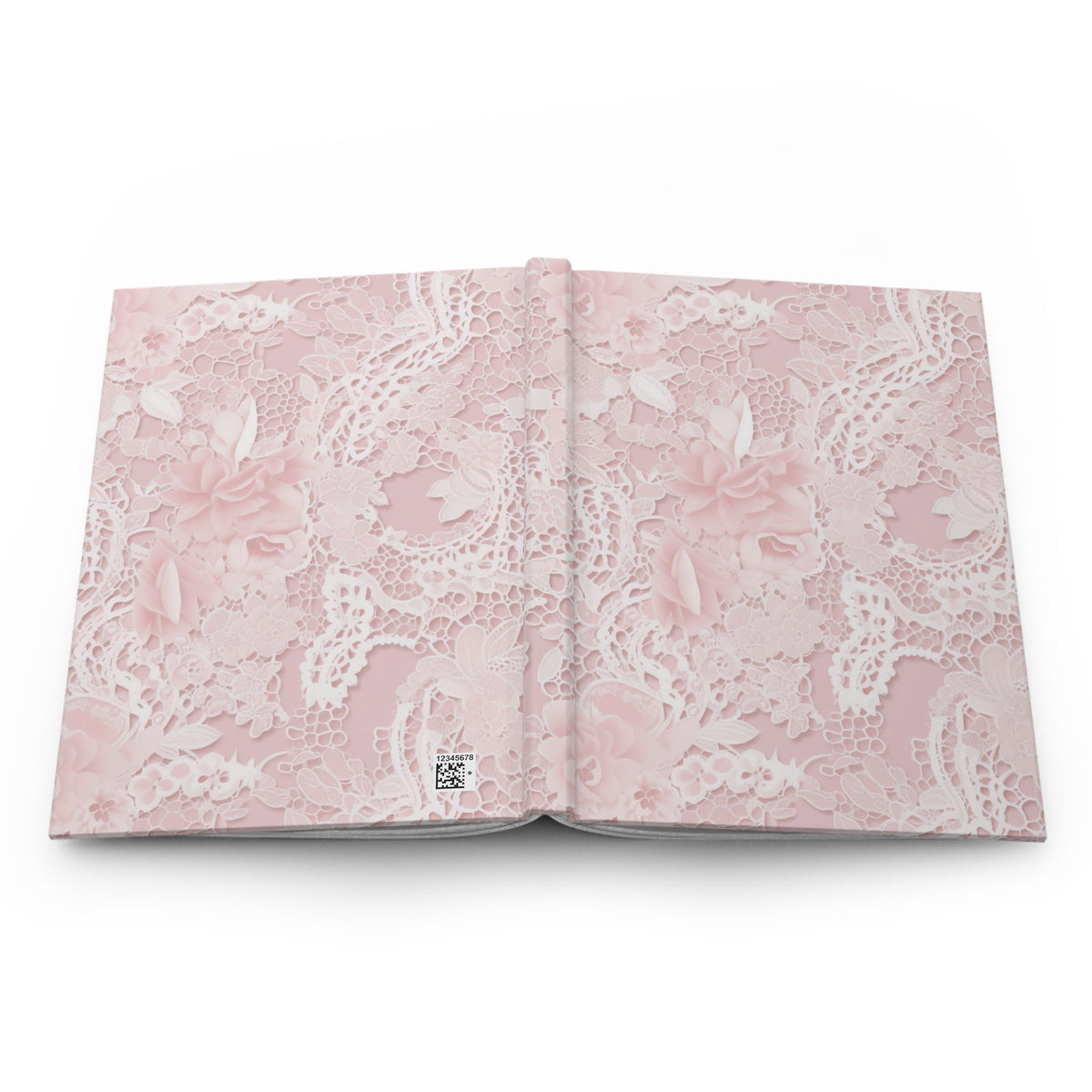 Open pink floral lace hardcover journal with patterned inner covers